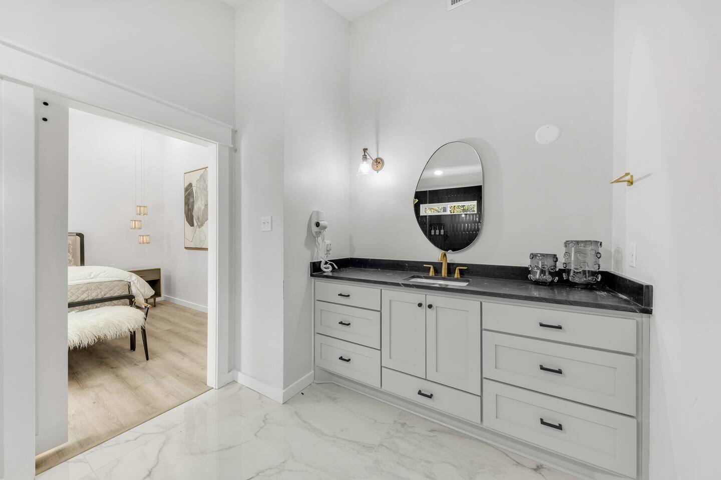 Luxury bathroom with marble floors and elegant vanity