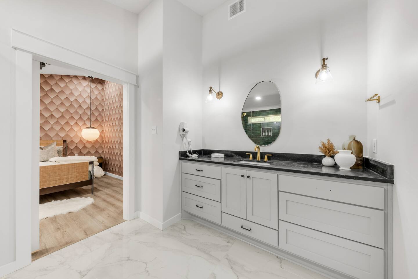 Bathroom 3 - Vanity with view to pink accent bedroom