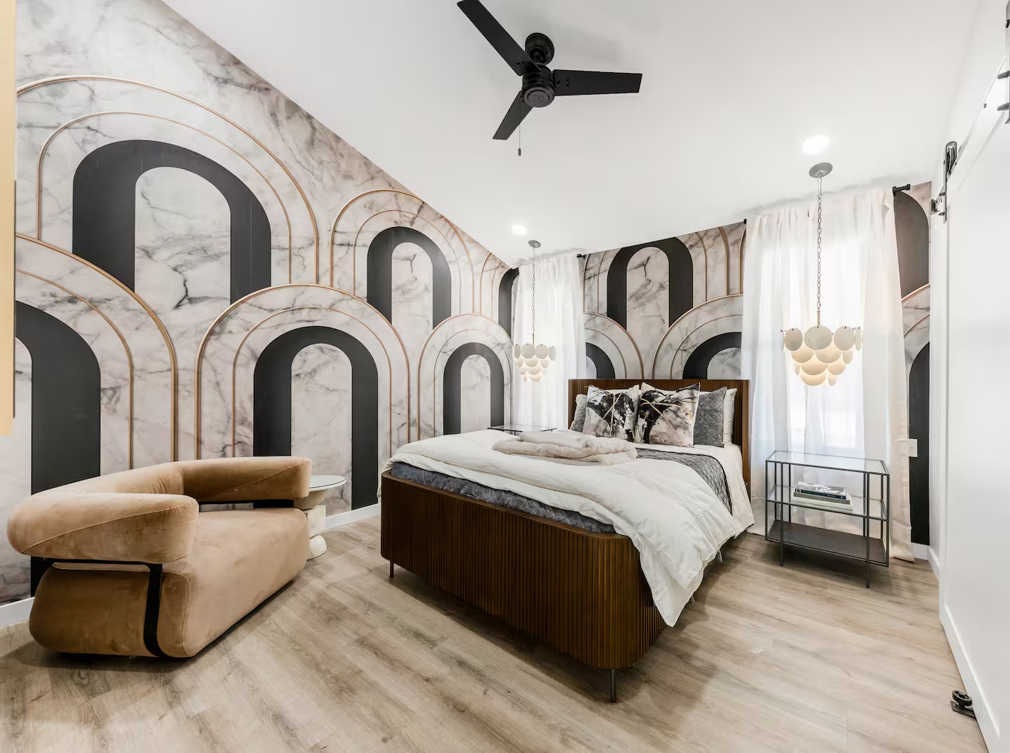 Luxury bedroom with marble arch pattern feature wall
