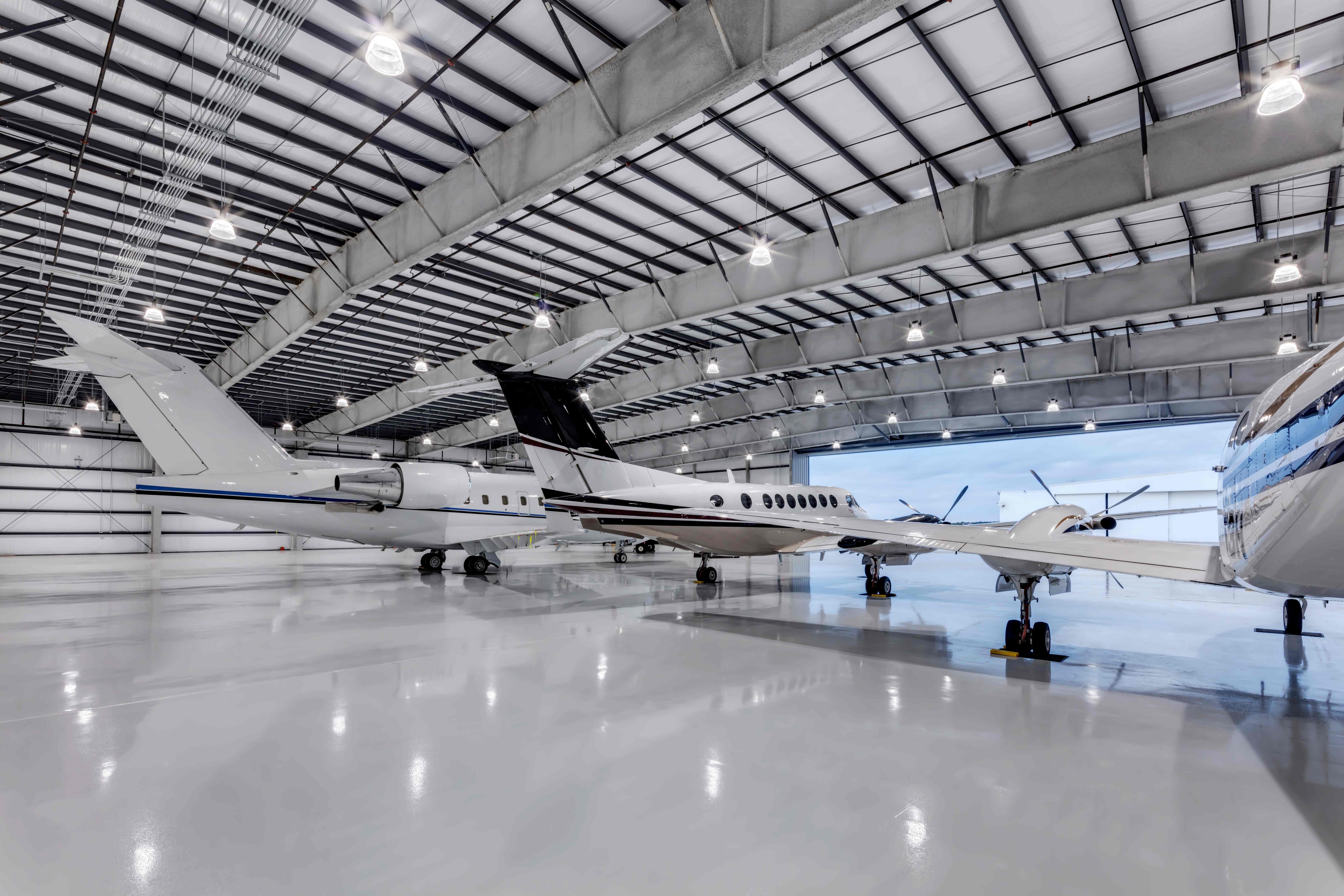 Luxury private jets in hangar